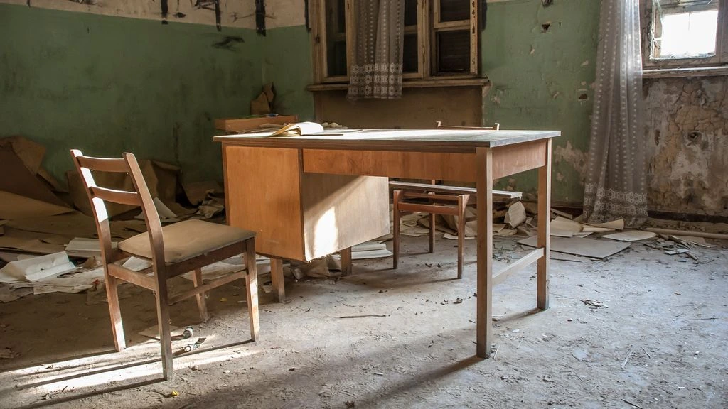 A working desk with a spreadsheet open, illustrating the income-report archive.